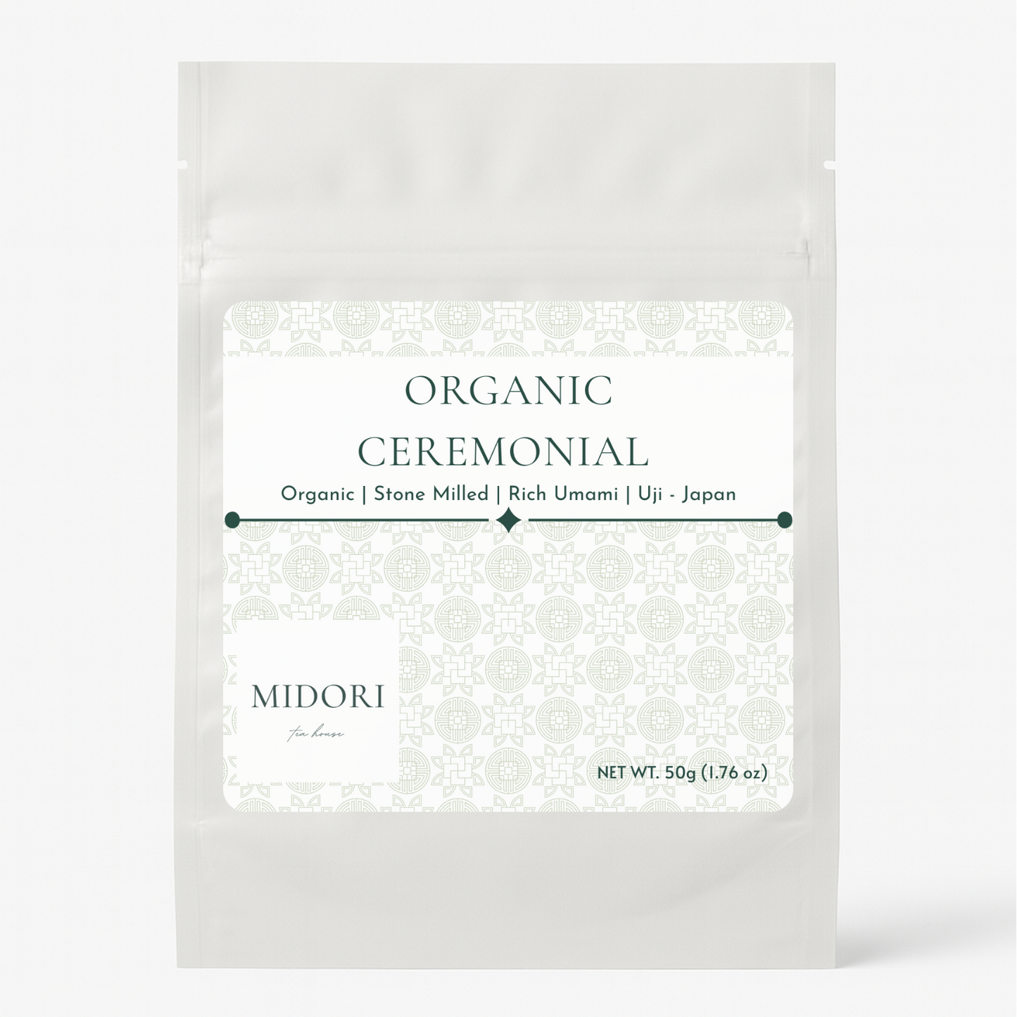 White packaging of Organic Ceremonial Midori on a white background